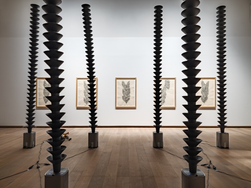 'Pheromone Traps', 2025, and charcoal rubbings from the series 'Multiple Scars', 2021, which are part of the Uppsala Art Museum collection. Photo: Jean-Baptiste Béranger